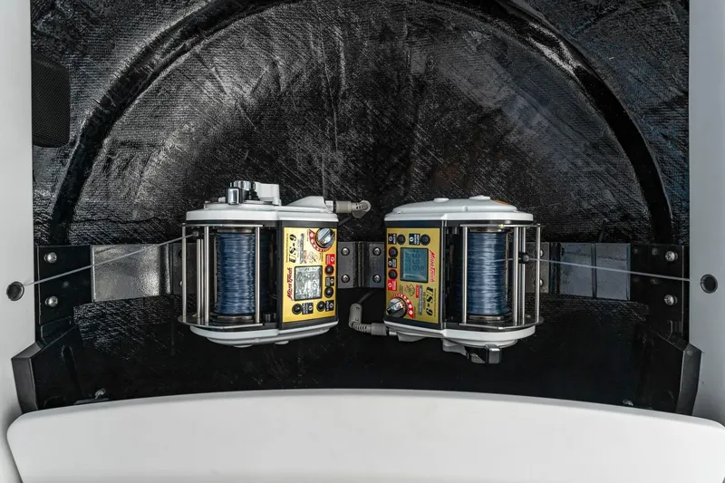 Slide: The Image of Fishing equipment on 2025 Viking 58 Convertible yacht, featuring advanced reels and controls. - 21