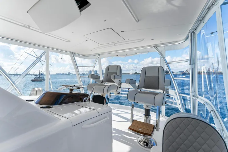 Slide: The Image of Luxurious interior of 2025 Viking 58 Convertible yacht with ocean view. - 27