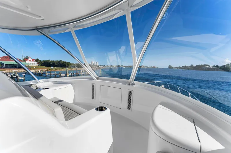Slide: The Image of 2025 Viking 58 Convertible yacht interior with panoramic ocean view. - 30