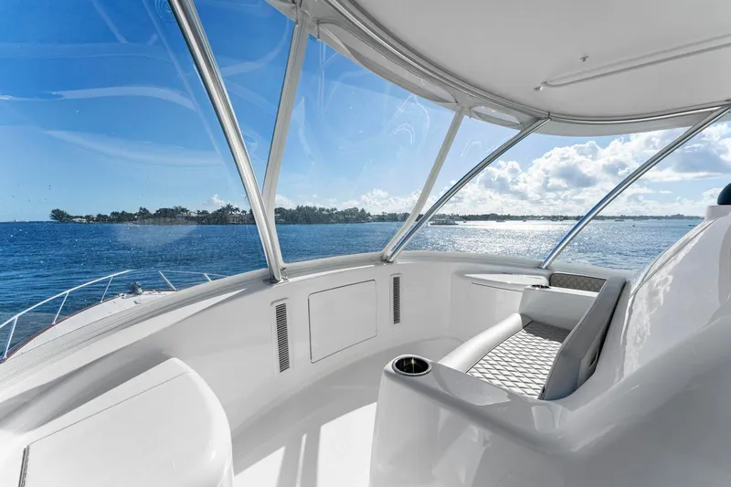Slide: The Image of Luxurious interior of 2025 Viking 58 Convertible yacht with ocean view. - 31