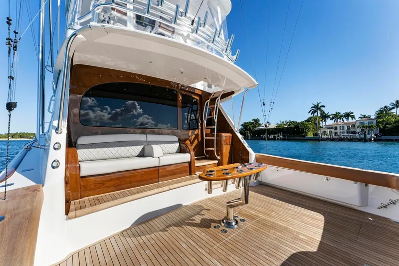 Slide: The Image of 2025 Viking 58 Convertible yacht with elegant deck and waterfront view. - 38