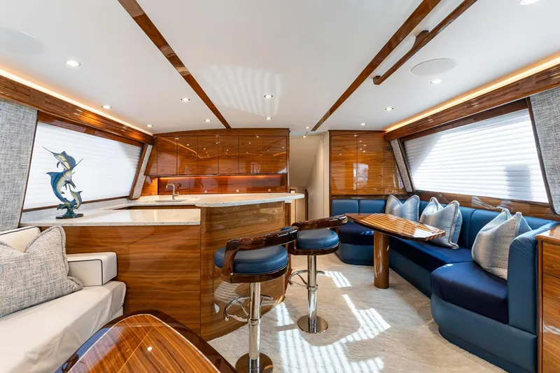 Slide: The Image of Luxurious interior of 2025 Viking 58 Convertible yacht with elegant seating and modern design. - 41