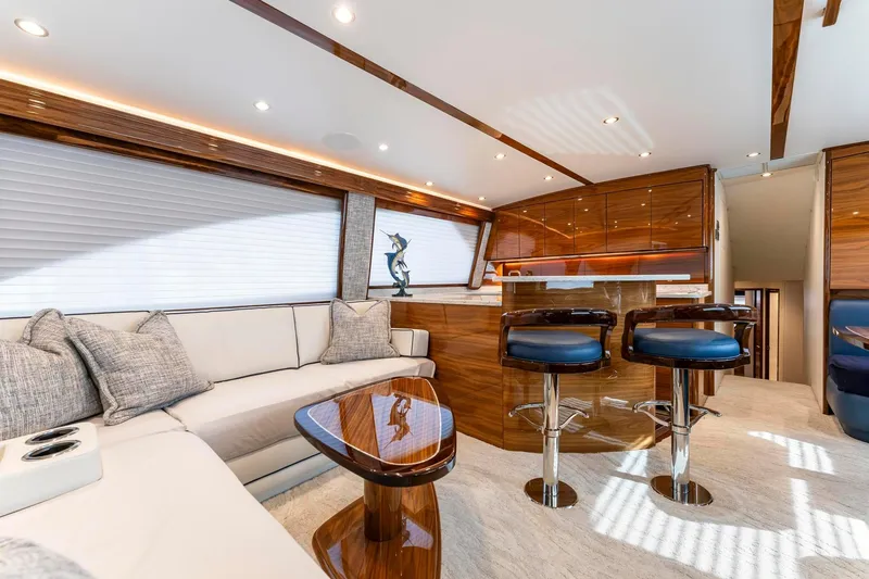 Slide: The Image of Luxurious interior of 2025 Viking 58 Convertible yacht with elegant seating and modern design. - 43