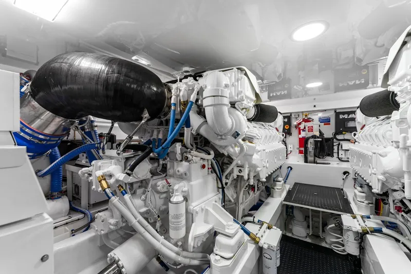 Slide: The Image of Engine room of 2025 Viking 58 Convertible yacht, showcasing advanced machinery and equipment. - 75