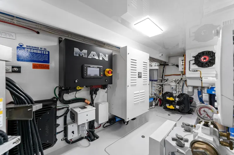 Slide: The Image of Engine room of 2025 Viking 58 Convertible yacht with MAN control system and equipment. - 81