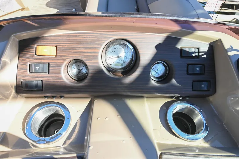 Slide: The Image of Dashboard of 2021 Bennington SX 23 Entertainment boat with gauges and controls. - 19