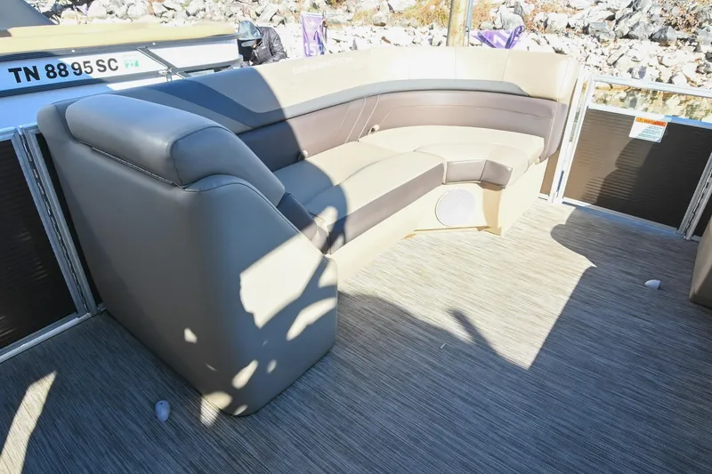Slide: The Image of 2021 Bennington SX 23 Entertainment boat interior with plush seating and modern design. - 21