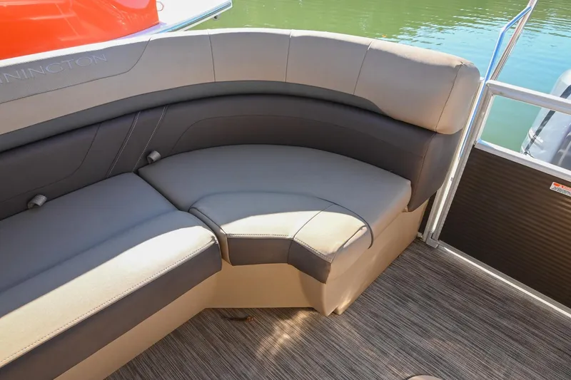 Slide: The Image of 2021 Bennington SX 23 Entertainment boat with luxurious seating and elegant design. - 8