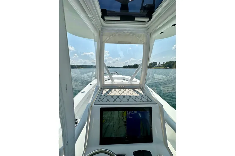 Slide: The Image of 2024 ZCB Freemason 26 Open boat with dual Mercury engines and Garmin equipment. - 10