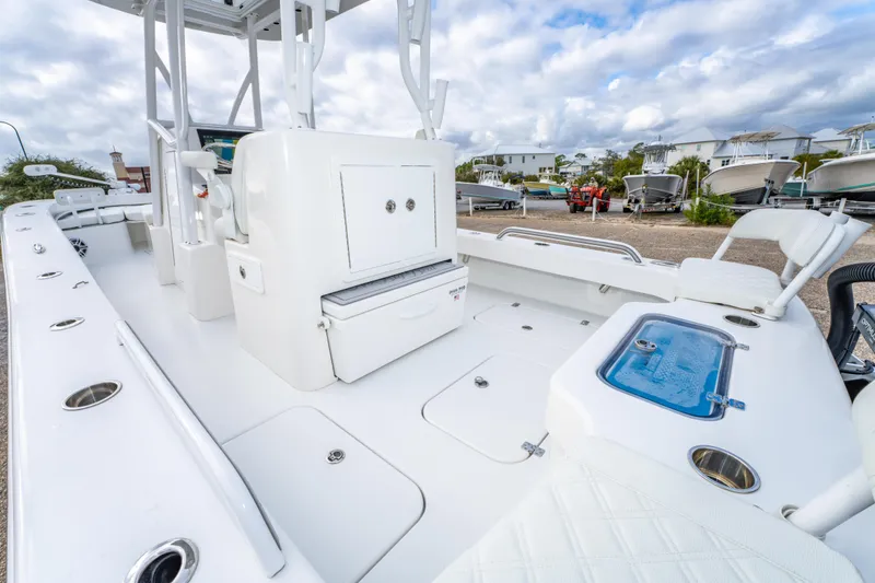 Slide: The Image of 2024 ZCB Freemason 26 Open boat interior with seating and storage compartments. - 24