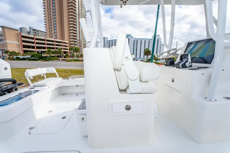 Slide: The Image of 2024 ZCB Freemason 26 Open boat interior with modern helm and seating. - 26