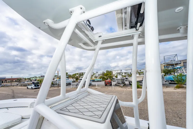 Slide: The Image of 2024 ZCB Freemason 26 Open boat with sturdy white framework and open deck design. - 35