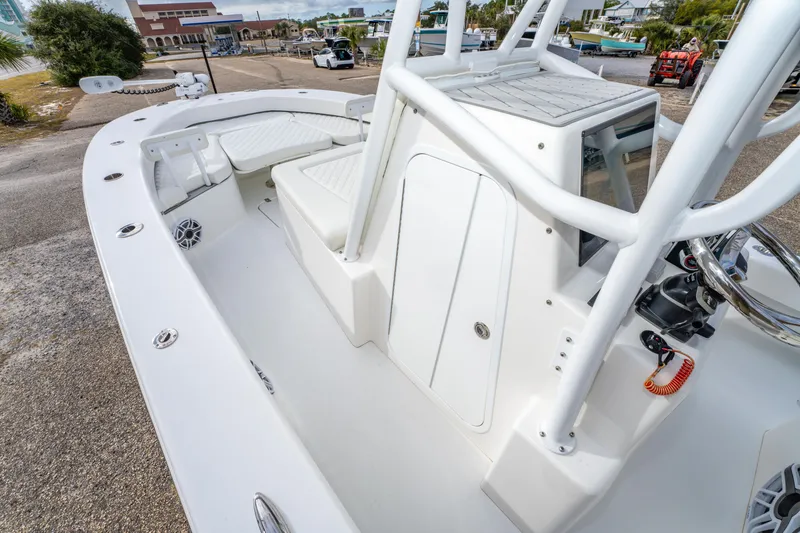 Slide: The Image of 2024 ZCB Freemason 26 Open boat interior with white seating and steering console. - 36