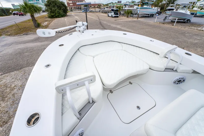 Slide: The Image of 2024 ZCB Freemason 26 Open boat with white cushioned seating and modern design. - 38