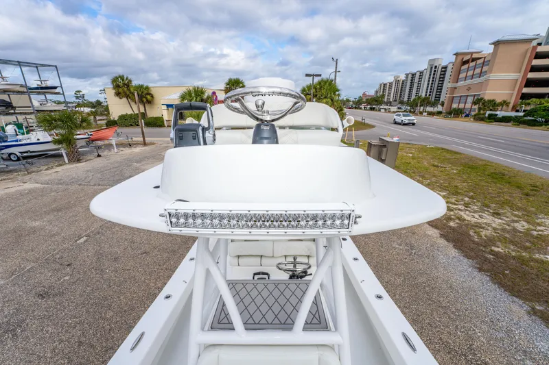 Slide: The Image of 2024 ZCB Freemason 26 Open boat on display, featuring sleek design and modern controls. - 43