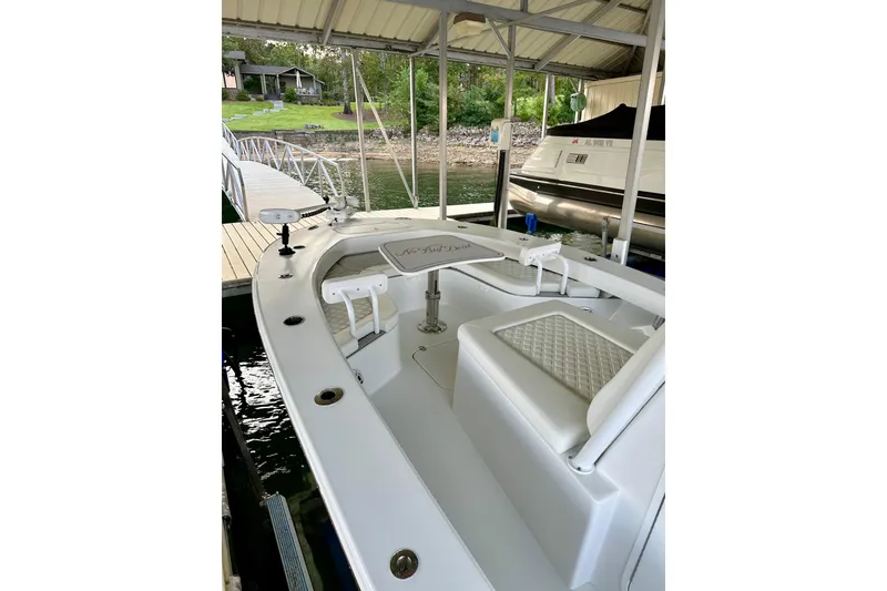 Slide: The Image of Overhead view of 2024 ZCB Freemason 26 Open boat on concrete surface. - 7