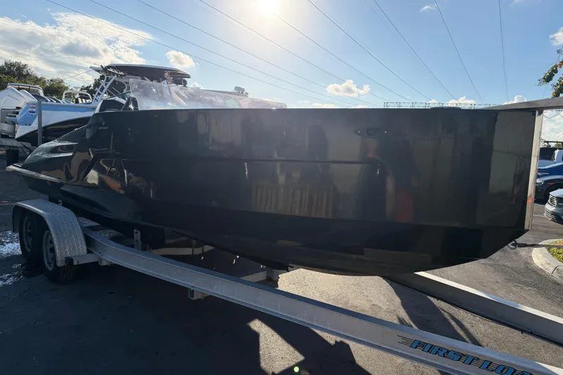 Slide: The Image of 2023 D-Boat Diamond 550 on trailer under sunny sky. - 7