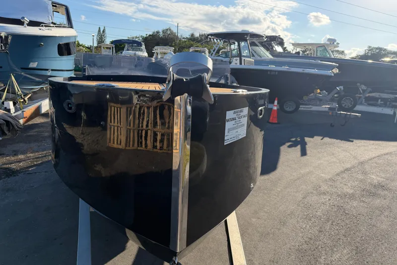 Slide: The Image of 2023 D-Boat Diamond 550 yacht displayed outdoors in a marina setting. - 8