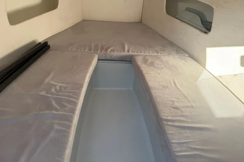 Slide: The Image of Interior cabin of 2023 D-Boat Diamond 550 with cushioned seating. - 9