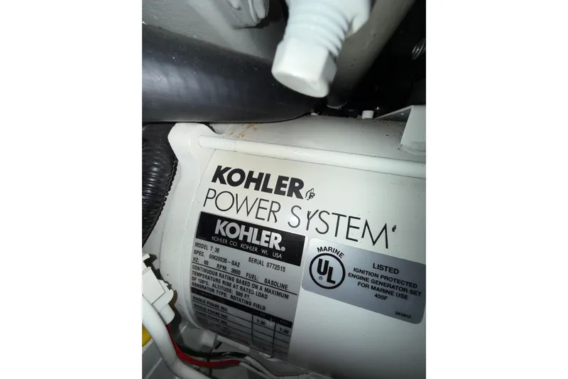 Slide: The Image of Control panel of a 2004 Formula 34 Performance Cruiser with hour meter display. - 16