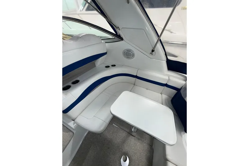 Slide: The Image of 2004 Formula 34 Performance Cruiser dashboard with gauges and control switches. - 24