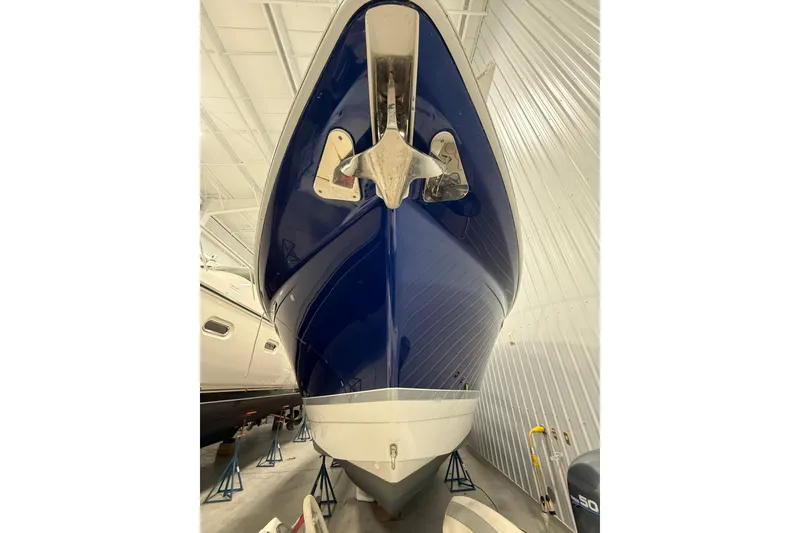 Slide: The Image of 2004 Formula 34 Performance Cruiser interior with white seating and blue accents. - 3