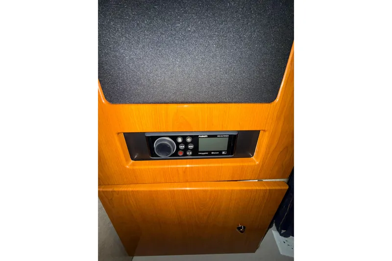 Slide: The Image of 2004 Formula 34 Performance Cruiser interior with TV and seating area. - 36