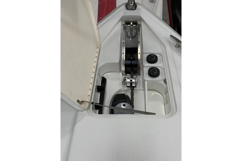 Slide: The Image of Engine compartment of a 2004 Formula 34 Performance Cruiser with visible wiring and pipes. - 8