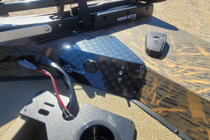 Slide: The Image of 2026 G3 Sportsman 1710 boat dashboard with Minn Kota Edge motor controls. - 15