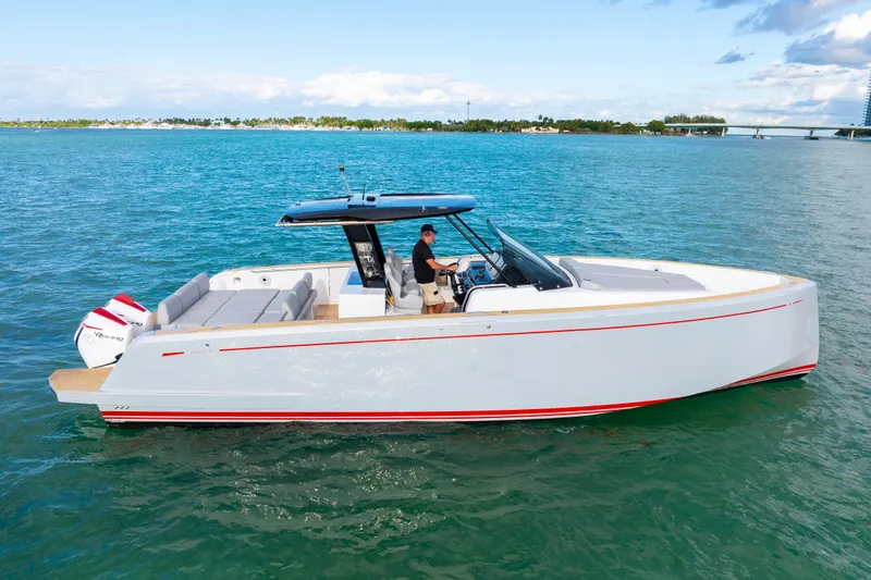 Slide: The Image of 2021 Pardo Yachts 38 cruising on clear blue waters, showcasing sleek design and luxury. - 17