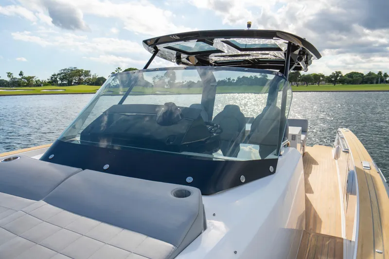 Slide: The Image of 2021 Pardo Yachts 38 on water, showcasing sleek design and luxurious seating. - 22