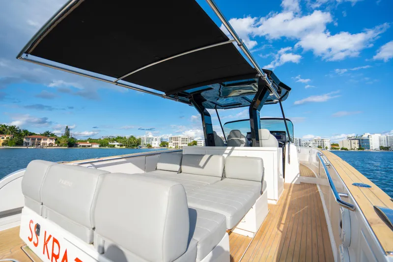 Slide: The Image of 2021 Pardo Yachts 38 on water, featuring sleek design and spacious seating. - 28