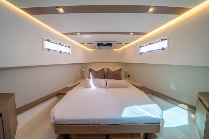 Slide: The Image of Cozy cabin interior of 2021 Pardo Yachts 38 with comfortable bedding and natural light. - 32