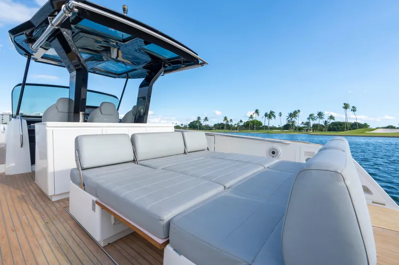 Slide: The Image of 2021 Pardo Yachts 38 on water, featuring sleek design and modern helm. - 50