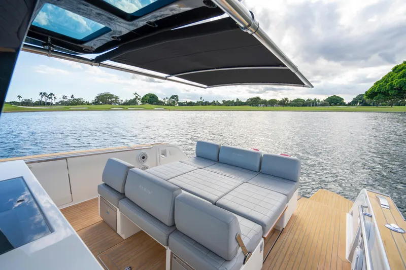 Slide: The Image of Luxury Pardo Yachts 38, 2021 model, with spacious deck and scenic waterfront view. - 14