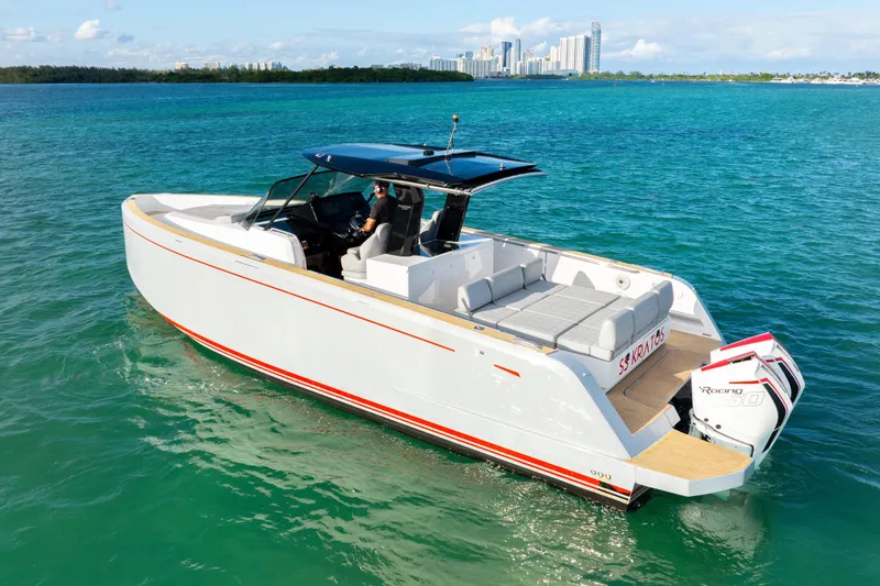 Slide: The Image of 2021 Pardo Yachts 38 cruising on clear turquoise water, showcasing sleek design and luxury. - 37