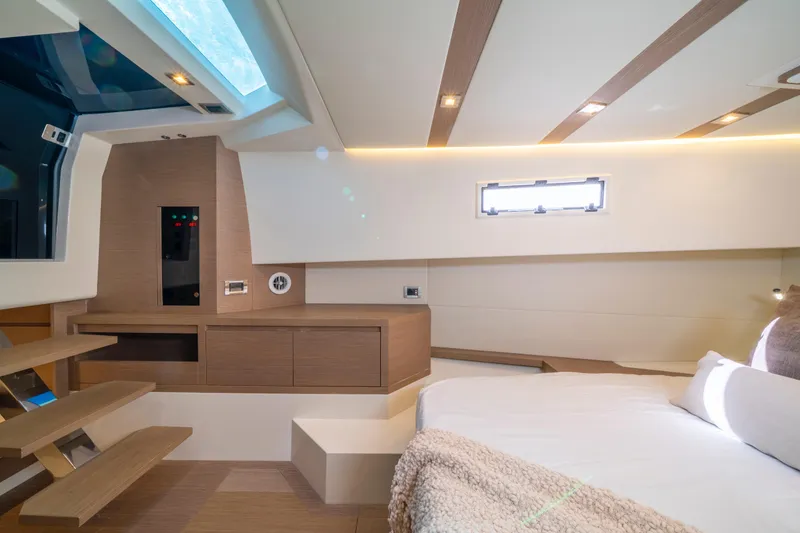 Slide: The Image of Helm of 2021 Pardo Yachts 38 with navigation display and controls. - 42