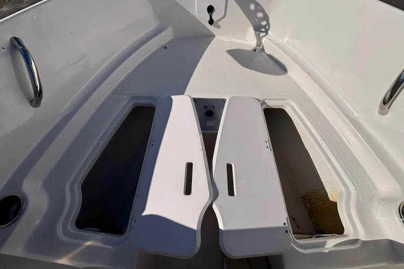 Slide: The Image of 2015 Chaparral 19 H2O Ski & Fish boat interior with storage compartments. - 15