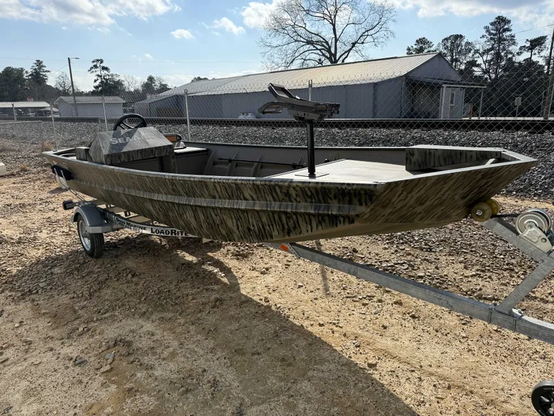 The Image of SeaArk 1648 Special Suzuki 30 Trailer boat, 2026 model, on a trailer. - 1