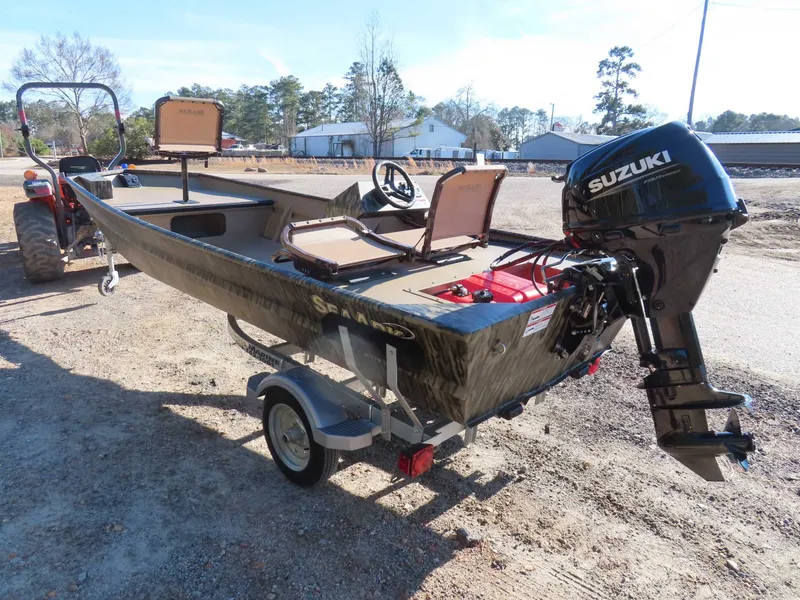 Slide: The Image of 2026 SeaArk 1648 Special with Suzuki 30 engine on trailer. - 15