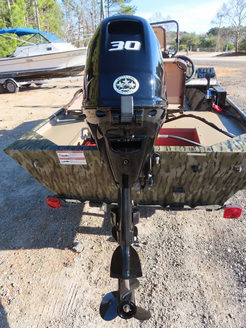 Slide: The Image of SeaArk 1648 Special Suzuki 30 Trailer boat, rear view, 2026 model. - 18