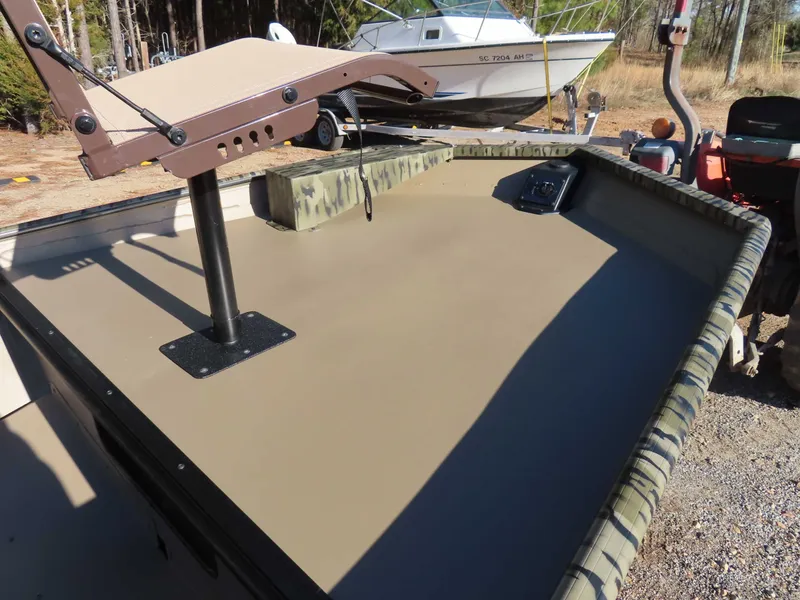 Slide: The Image of SeaArk 1648 Special Suzuki 30 Trailer boat, 2026 model, on a trailer. - 23