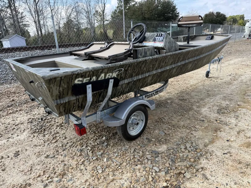 Slide: The Image of SeaArk 1648 Special Suzuki 30 Trailer boat, 2026 model, parked outdoors. - 3