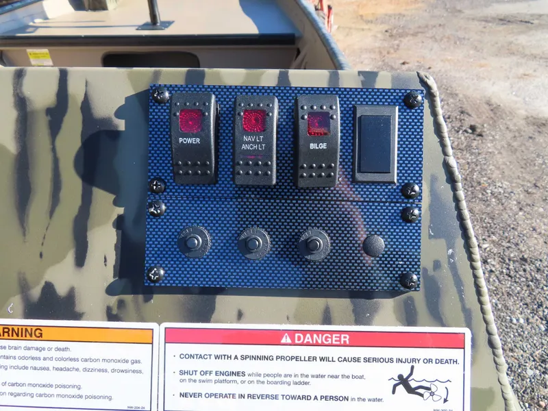 Slide: The Image of Control panel of a 2026 SeaArk 1648 Special Suzuki 30 boat. - 5