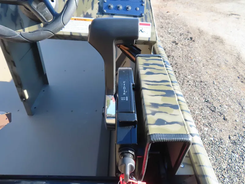 Slide: The Image of Close-up of throttle control on SeaArk 1648 Special Suzuki 30 boat. - 6