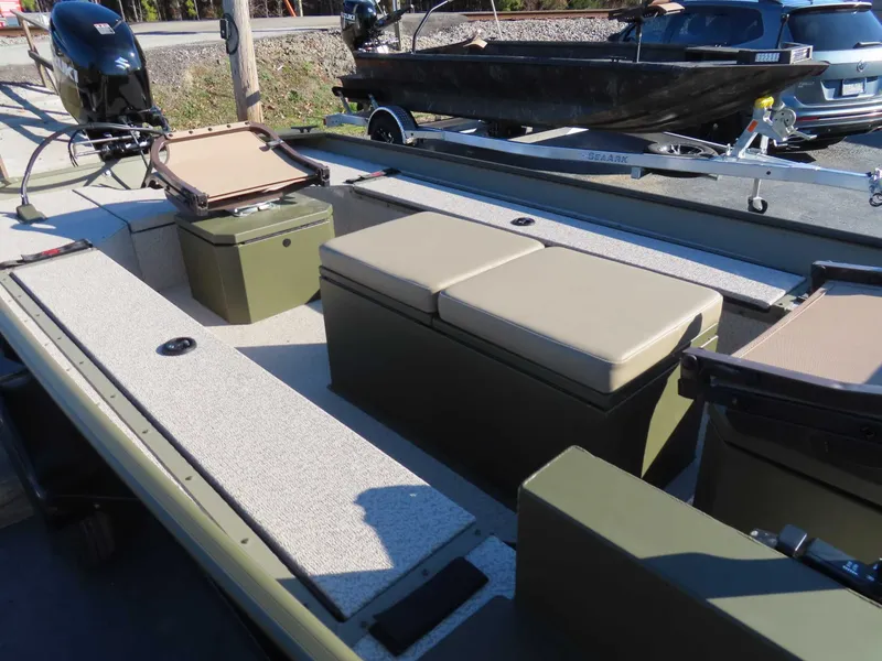 Slide: The Image of Interior view of SeaArk 1652 Crappie boat with Suzuki 40 engine. - 15