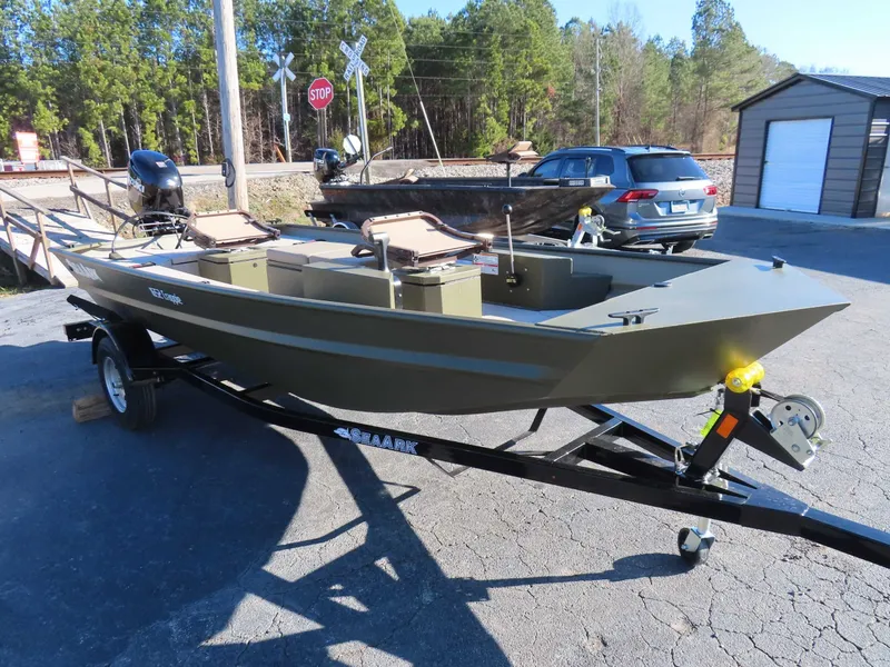 Slide: The Image of SeaArk 1652 Crappie Suzuki 40 Trailer boat, 2026 model, parked outdoors. - 9
