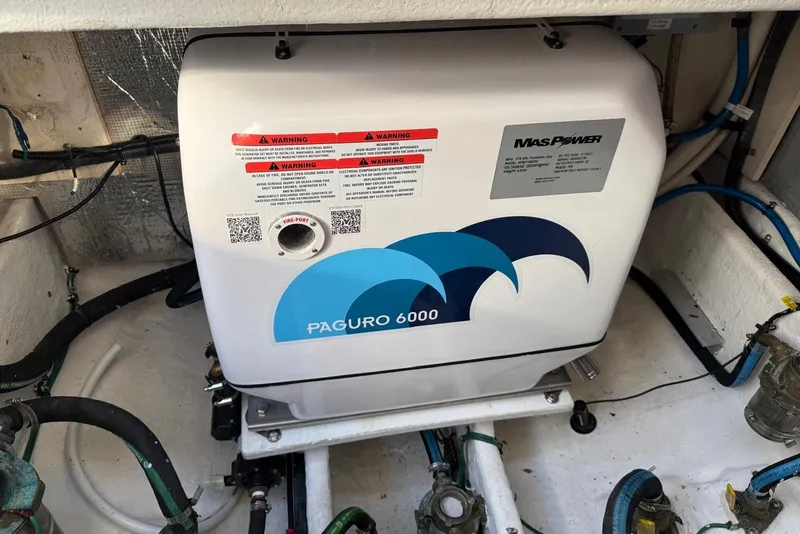 Slide: The Image of Engine compartment of a 2007 Sea Ray 270 Amberjack with Paguro 6000 generator. - 10