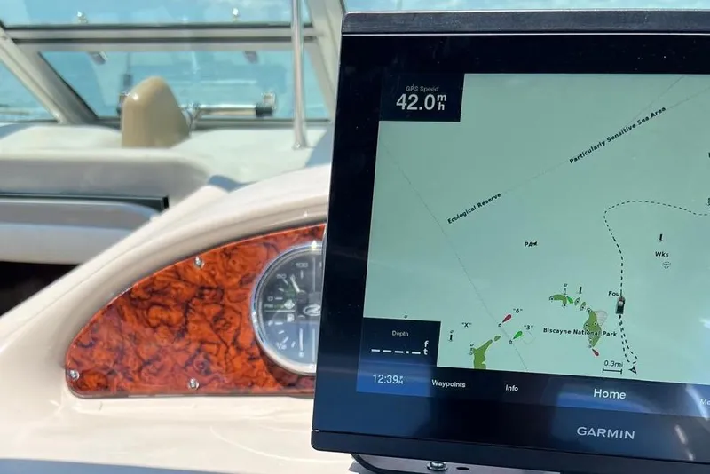 Slide: The Image of Garmin GPS on 2007 Sea Ray 270 Amberjack, displaying speed and navigation map. - 9