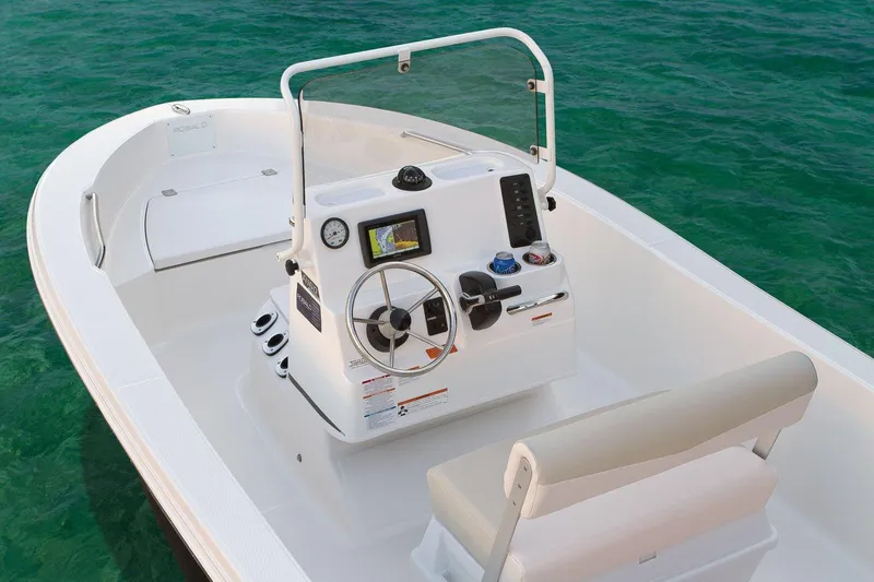 Slide: The Image of Manufacturer Provided Image: 2019 Robalo R160 Center Console boat on clear water. - 5